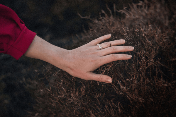 Moira Fuller, Business Strategist in the UK, hand on heather outdoors